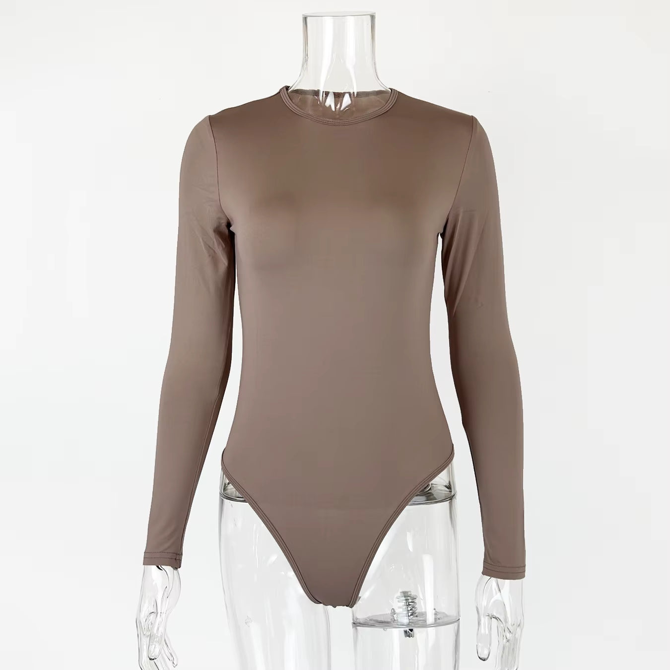 Brown long sleeve fabric bodysuit with a crew neck displayed on a clear plastic mannequin.
